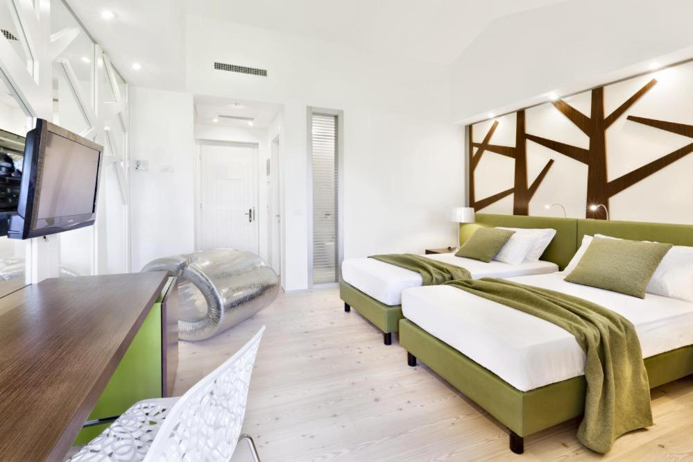 Ai Cadelach Hotel Giulia Revine Lago Екстериор снимка
